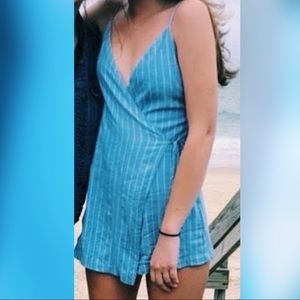 Lulu’s Blue Pinstripe Wrap Around Romper